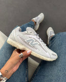 New Balance 204L em Couro Original - Cinza Lilás