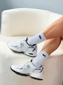 New Balance 530 1ª linha - Branco/Marinho