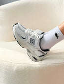 New Balance 530 1ª linha - Branco/Marinho