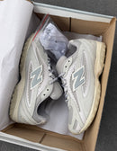New Balance 204L em Couro Original - Cinza Lilás