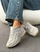 New Balance 204L em Couro Original - Cinza Lilás