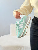 New Balance 574 Couro