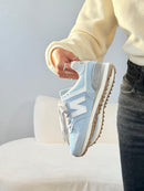 New Balance 574 Couro