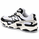 New Balance 9060R branco/preto - traseira em diagonal