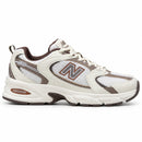 New Balance 530 Off/Café — vista lateral