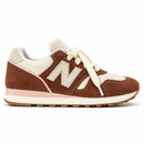 New Balance 574 Marrom — vista lateral com a ponta à direita