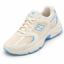 New Balance 530 Off/Azul — vista frontal em três quartos, ponta à esquerda