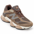 New Balance 9060 Chocolate — vista frontal em três quartos, ponta à direita