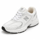 New Balance 530 Branco/Cinza — vista frontal medial em três quartos, ponta à esquerda