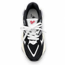 New Balance 9060 Preto/Preto/Off, vista superior de um pé, fundo branco