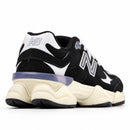 New Balance 9060 Preto/Preto/Off, vista traseira em três quartos, fundo branco
