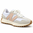 New Balance 327 Off/Rosê — vista frontal oblíqua com a ponta à direita