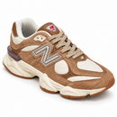 New Balance 9060 Aveia — vista frontal em três quartos, ponta à direita
