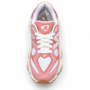 New Balance 9060 Branco/Rosa — vista superior de um tênis