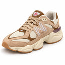 New Balance 9060 Areia — vista frontal medial em três quartos, ponta à esquerda