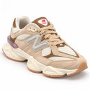 New Balance 9060 Areia — vista frontal em três quartos, ponta à direita