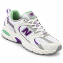 New Balance 530 White / Purple / Mint em estúdio, vista frontal em três quartos.