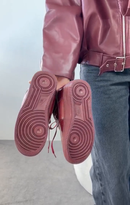 Foto do solado extraída do vídeo original Nike Air Force Marsala