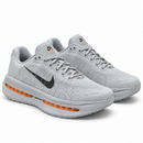Nike Vomero Cinza/Laranja — par em perspectiva