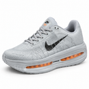 Nike Vomero Cinza/Laranja — frente em diagonal