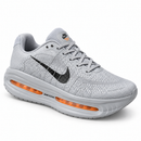 Nike Vomero Cinza/Laranja — frente e lateral externa