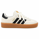 Sambae Tricô Off/Black em estúdio branco, perfil lateral